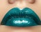 Glamour green Gloss Lip Make-up. Fashion Makeup Beauty Shot. Close-up full Lips with celebrate Aquamarine Lipgloss