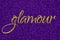 Glamour lettering word gold on ultra violet glitter texture. Shiny sparkle background