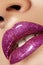 Glamour magenta gloss lip make-up. Fashion makeup beauty shot. Close-up female full lips with celebrate pink gloss