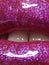 Glamour magenta gloss lip make-up. Fashion makeup beauty shot. Close-up female full lips with celebrate pink gloss