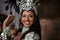 Glamourous dancing queen. a beautiful samba dancer wearing a headdress.