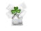 Glamourous home with glitter and white bow with green shamrock on white background. Buying high value house property in Ireland.
