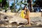 Glamourous portrait of young beautiful woman posing near the beach