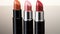 Glamourous women showcase vibrant beauty with shiny, elegant lipstick generated by AI