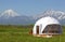 Glamping house in summer and volcano, rural landscape, tent houses in Kamchatka peninsula. Selective focus.