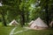 Glamping tent in the woods on a calm afternoon.