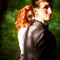 glance of the redhead bride next to the groom