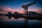 Glasgow Scotland June 2021 Glasgow Skyline reflecting in water at sunset