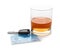 Glass of alcohol, car key and driver license on white. Responsible driving concept