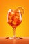 Glass of Aperol Spritz cocktail with ice cubes.