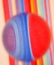 Glass ball on colored stripes