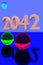 Glass balls on reflective surface and the year 2042