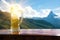 A glass of beer against the backdrop of the Matterhorn in the Sw