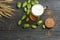 Glass beer with hop cones and wheat ears on dark wooden background. Beer brewery concept. Beer background. top view