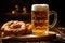 A glass of beer with a pretzel on a wooden table, Oktoberfest