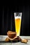 Glass of beer with spicy crackers, bread with spices. Snack for beer dried smelts