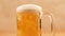 Glass beer on wood background with copyspace