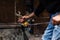 Glass blower at work in workshop in Murano, Italy