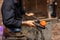 Glass blower at work in workshop in Murano, Italy