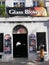 Glass blowing studio with life sized model outside on the Rock of Gibraltar at the entrance to the Mediterranean Sea