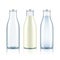 Glass bottle with milk, water and empty