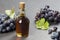 Glass bottle of organic black grape balsamic vinegar made from fermented fresh grapes