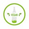 Glass bottle with organic goods- Vegan food logo indicating healthy condiment