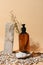 Glass bottle for soap, SPA, cosmetic care. Monochrome vertical creative composition on beige. Natural skin care concept