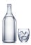 Glass and bottle of vodka, chilled alcohol drink, on white background. Clipping path