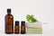 glass bottles of brown color and two bars of natural soap on a white isolated background. natural self-care. Mockup beauty
