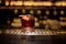 Glass of a Boulevardier cocktail with orange zest and ice cube on the steel wooden bar counter