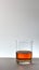 Glass bourbon whiskey white background