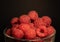 Glass Bowl of Bright Raspberries