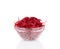 Glass bowl full with grated beets.