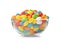 Glass bowl of tasty bright jelly beans isolated