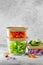 Glass boxes with fresh raw vegetables. Healthy Meal Prep - recipe preparation photos. Healthy vegan dishes in glass containers.