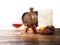 Glass of brandy, barrel, old paper on a white background