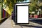 Glass bus shelter at a busstop. empty ad panel and billboard sign