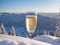 A Glass Of Champagne Sitting On Top Of A Snow Covered Hill. Generative AI