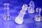 Glass chessmen in blue light