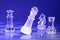 Glass chessmen in blue light