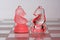 Glass chessmen in red light