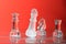 Glass chessmen in red light