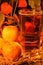 Glass of cider surrounded by apples and Autumn foliage