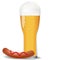 Glass cold beer with sausage.