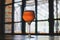 A glass of cold craft beer stands on a table in a restaurant