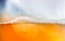 Glass with cold drink beer with condensation ice cool beverage background