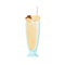 Glass of cold vanilla milkshake decorated with pieces of chocolate and caramel candies. Delicious summer beverage