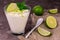 A glass of delicate lime-mint dessert Close-up.