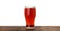 Glass of delicious kvass on wooden table, background